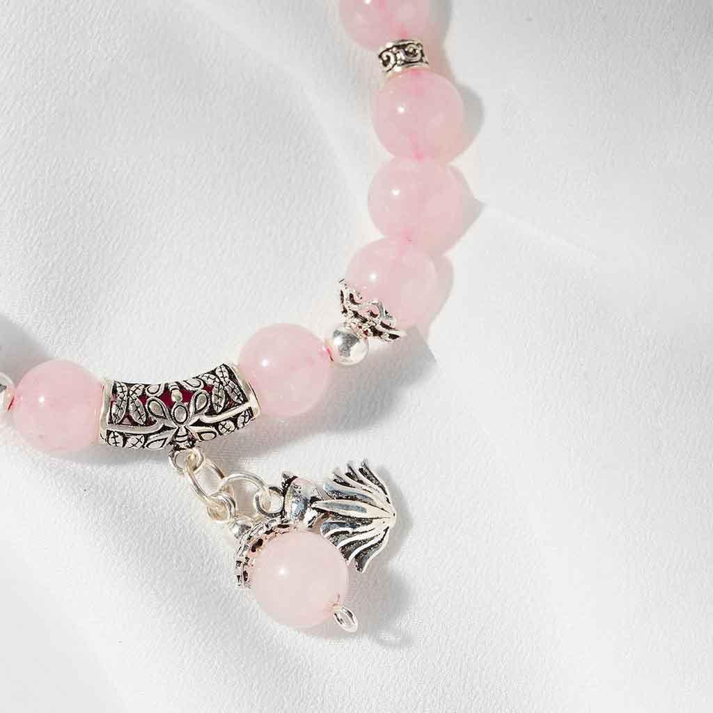 Vòng đá. Thach Anh Hồng chất lượng 5A mix charm cỏ 4 lá xinh xắn hợp mệnh Hỏa và Thổ