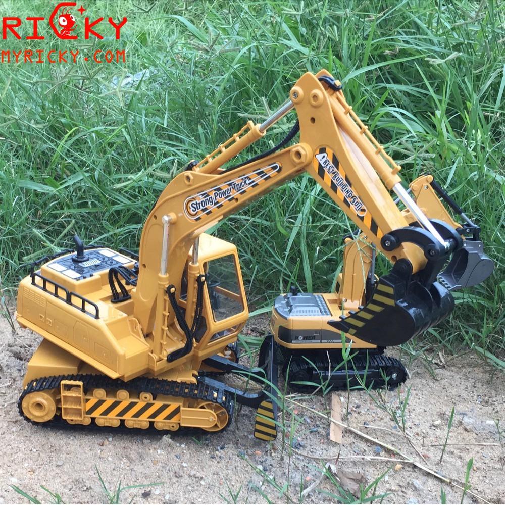 () Xe múc điều khiển từ xa, bánh xích- xoay mâm - pin sạc - có đèn nhạc 9 kênh cực lớn - Dành bé Năng Động