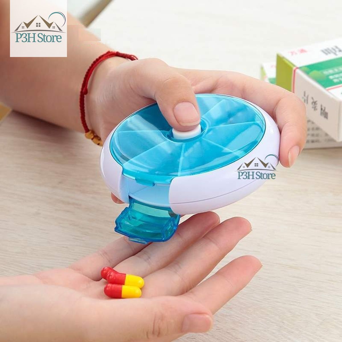 Hộp chia thuốc 7 ngăn hình tròn có nút bấm xoay lấy thuốc tiện dụng RY-167