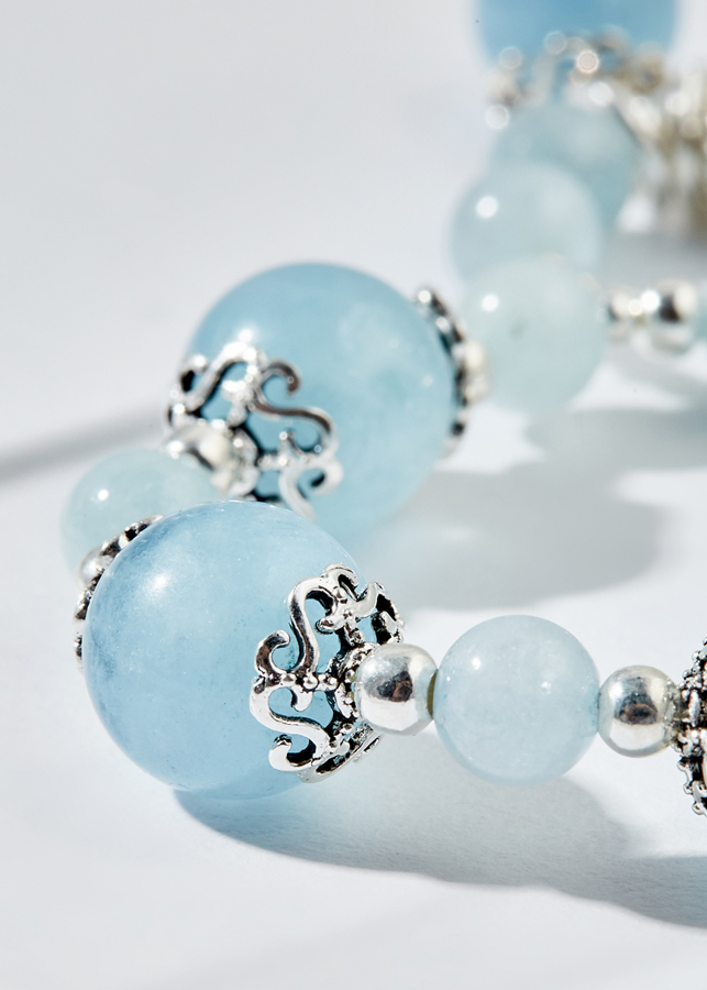 Vòng tay đá hải lam ngọc charm hồng hạc Ngọc Quý Gemstones