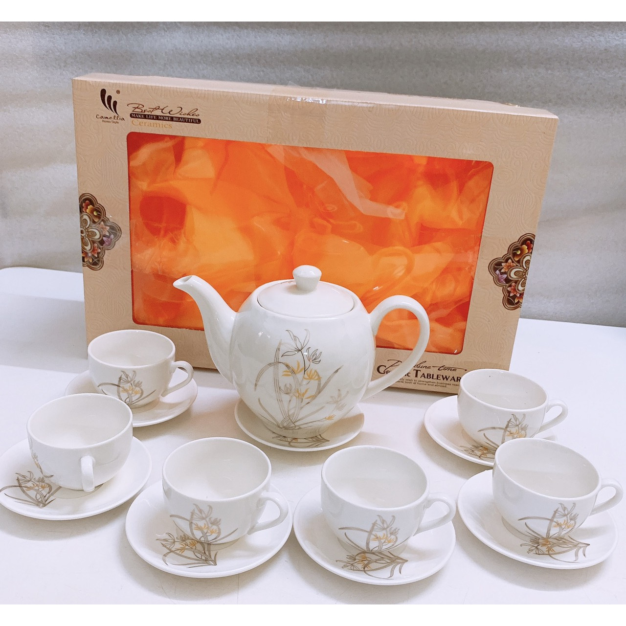 BỘ ẤM CHÉN PHA TRÀ GỒM 6 CỐC 7 ĐĨA SỨ TRẮNG HOA ÁNH BẠC -ANTH251
