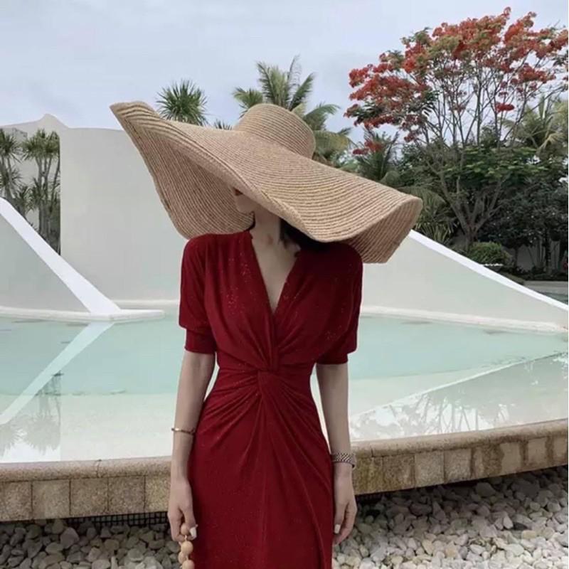 ĐẦM SAQUIN XOẮN EO