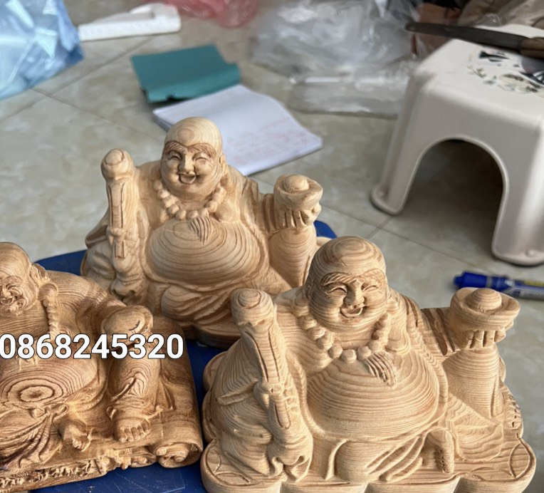 Tượng phật di lặc mini nâng thỏi vàng gỗ ngọc am thơm nức kt 15×9×9cm
