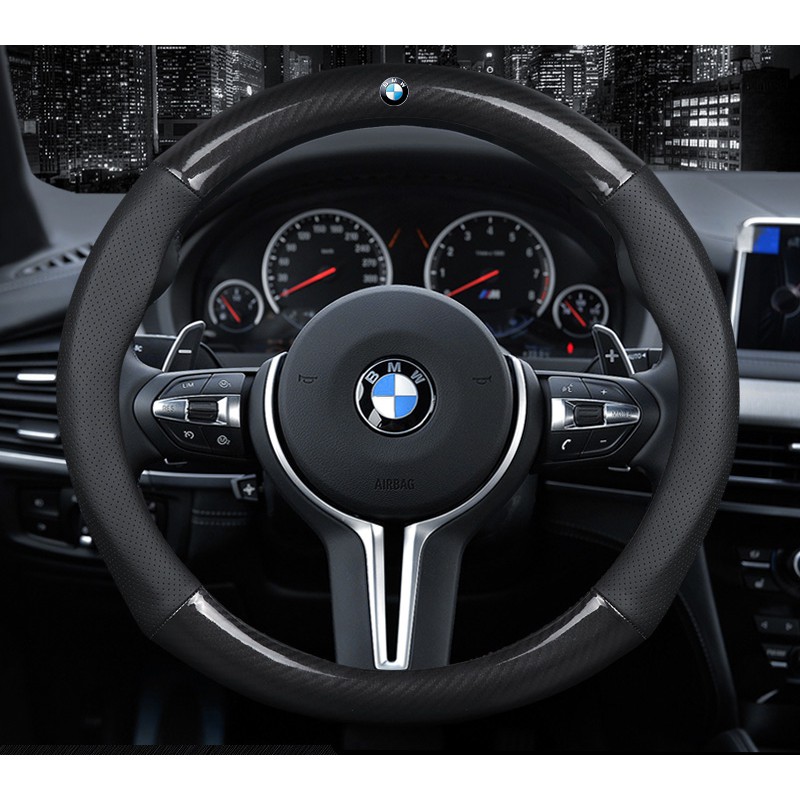 Hình ảnh Bọc vô lăng TTAUTO cho xe ô tô từ 4 đến 7 chỗ chất liệu da vân carbon cao cấp có logo BMW (Đen)