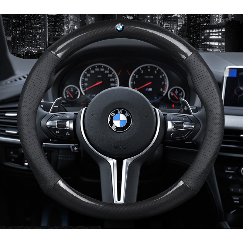 Bọc vô lăng TTAUTO cho xe ô tô từ 4 đến 7 chỗ chất liệu da vân carbon cao cấp có logo BMW