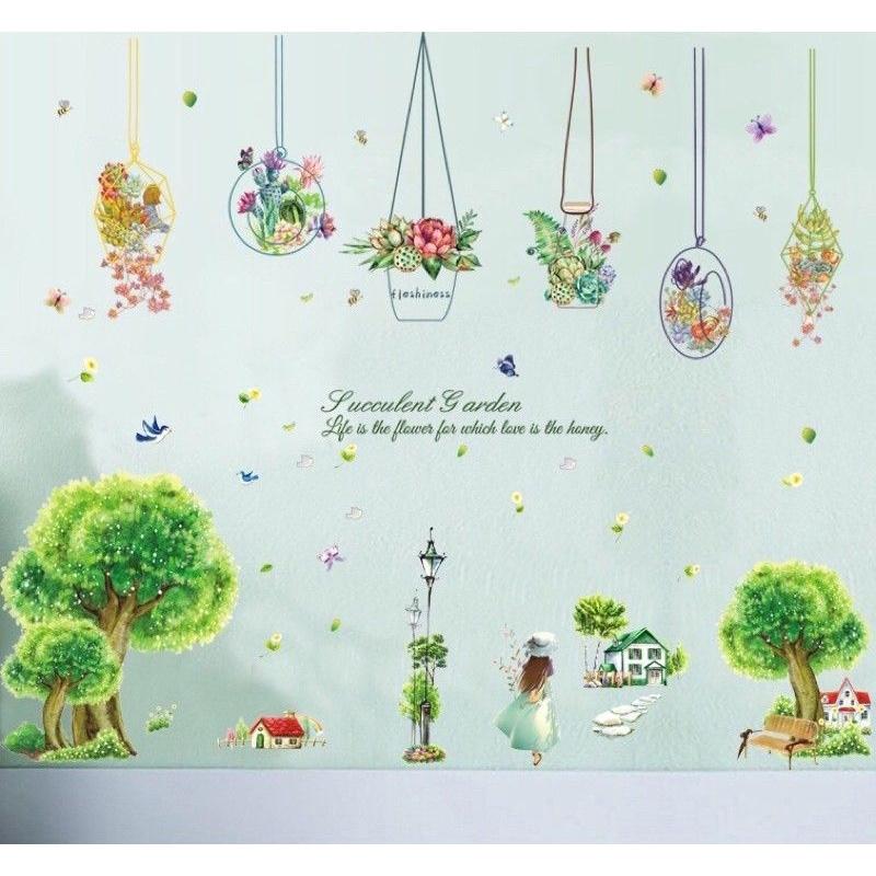 Decal dán tường cây xanh cô gái và giỏ cây treo