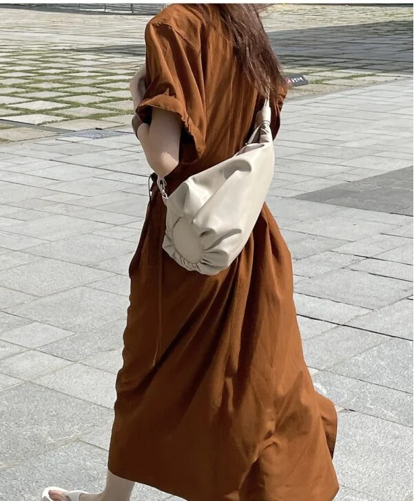 ĐẦM SUÔNG SƠ MI CAM ĐẤT