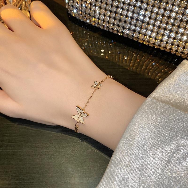 Lắc tay vòng tay nữ titan không gỉ mặt đôi bướm đẹp Ring House