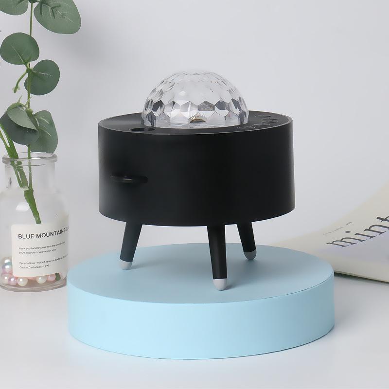 Phong cách mới nhất vũ trụ đầy sao đèn chiếu loa bluetooth điều khiển từ xa máy chiếu chân máy đầu giường bầu không khí sáng tạo đèn đèn ngủ