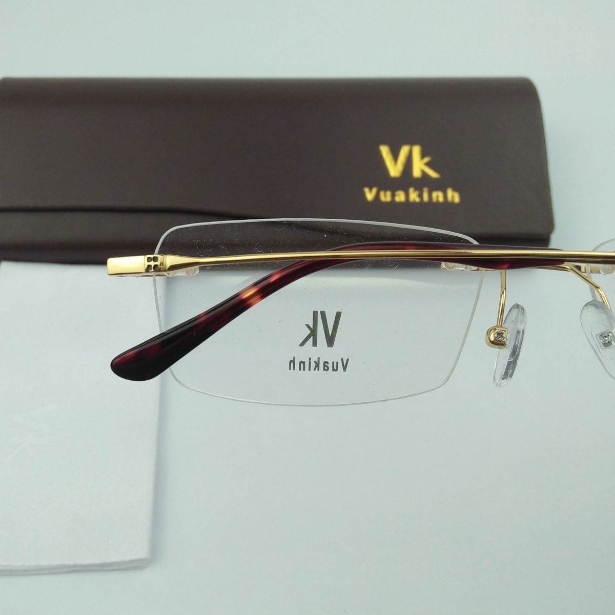 Gọng kính cận titan không viền VK gọng tăm mạ vàng VK-11