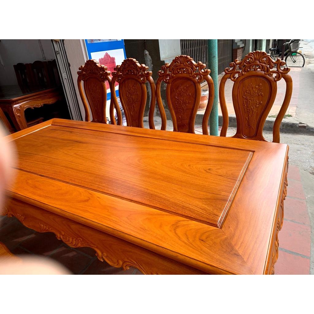 Bàn ăn gỗ gõ mặt tràn 8 ghế