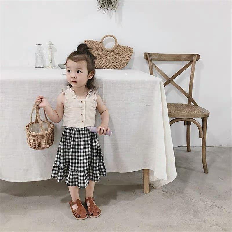 Set áo crop top mix chân váy kẻ cho bé gái 2 màu trắng/cam SBG