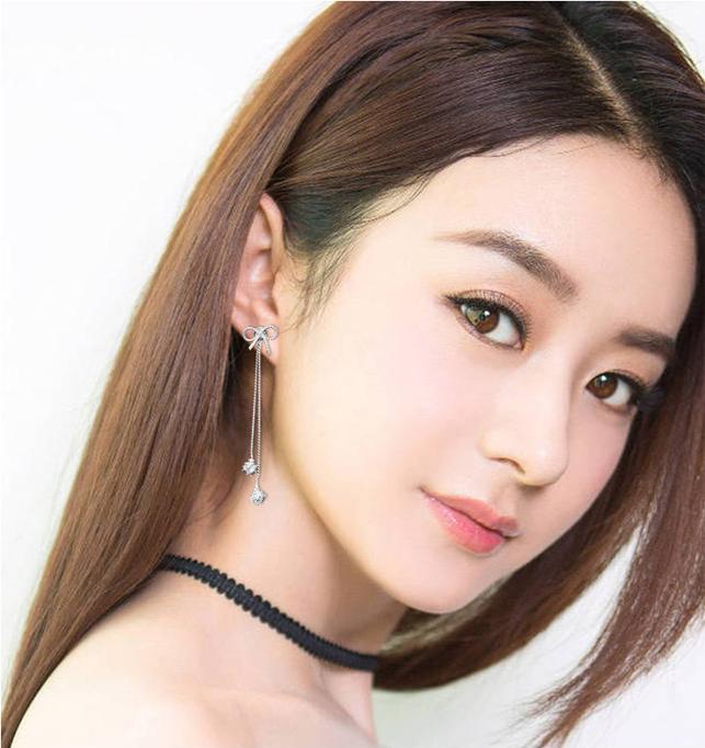 Bông tai thắt hình nơ thả tua dài đính đá lấp lánh