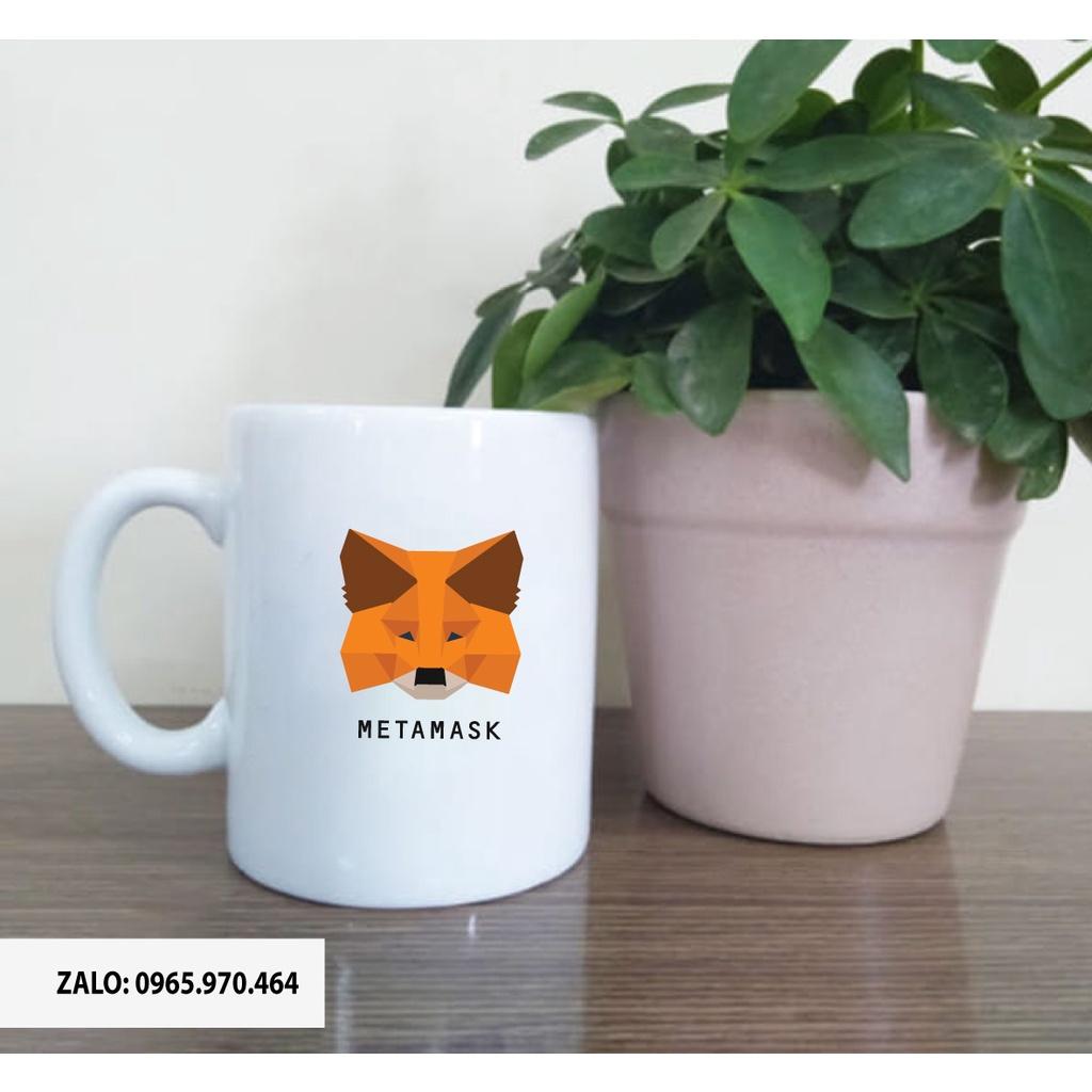 Ly Sứ Có Quai Họa Tiết LOGO VÍ METAMASK - In hình lên ly sứ, cốc theo yêu cầu của bạn - IN HÌNH LÊN LY LỚP, CÔNG TY