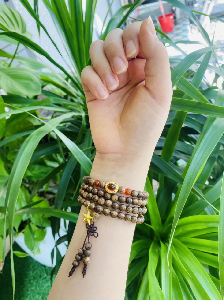 Vòng tay Trầm Hương tốc mix charm phong thủy