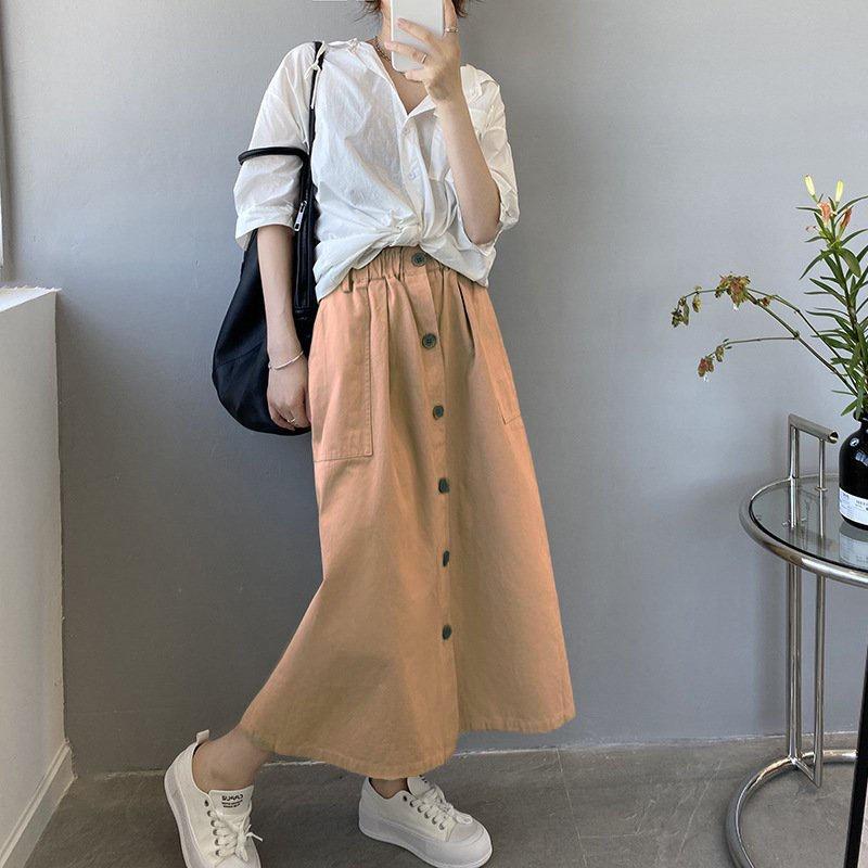 Chân váy xòe dài phong cách hàn quốc , váy chất liệu kaki dài 2 lớp , 2 màu : nude , rêu . Ms : 15