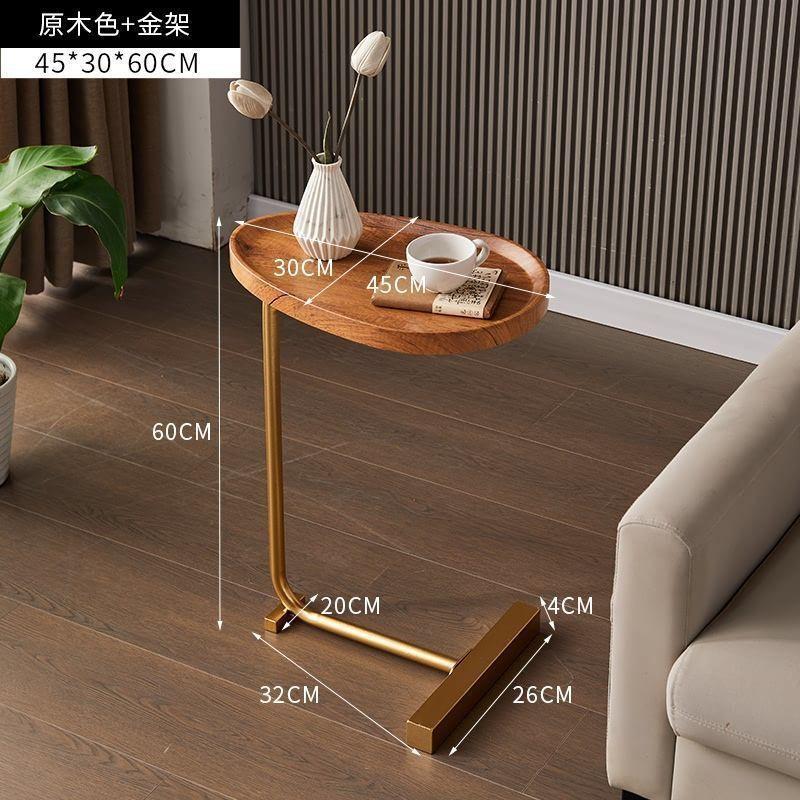 Bàn gỗ tab đầu giường chân sắt sơn tĩnh điện hình hạt đậu trang trí cạnh ghế sofa