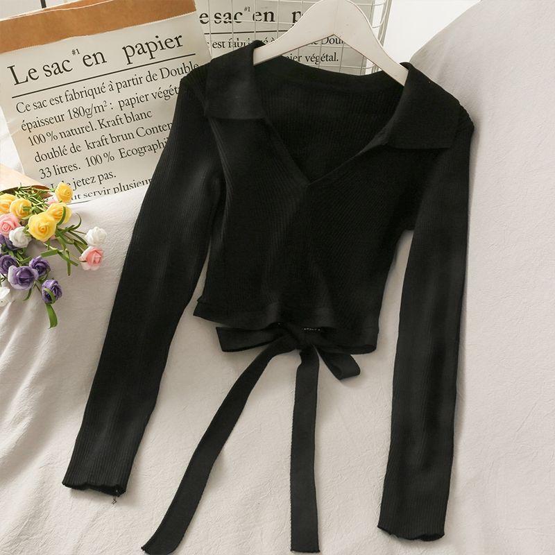 Áo croptop tay dài hở lưng buộc nơ trắng đen