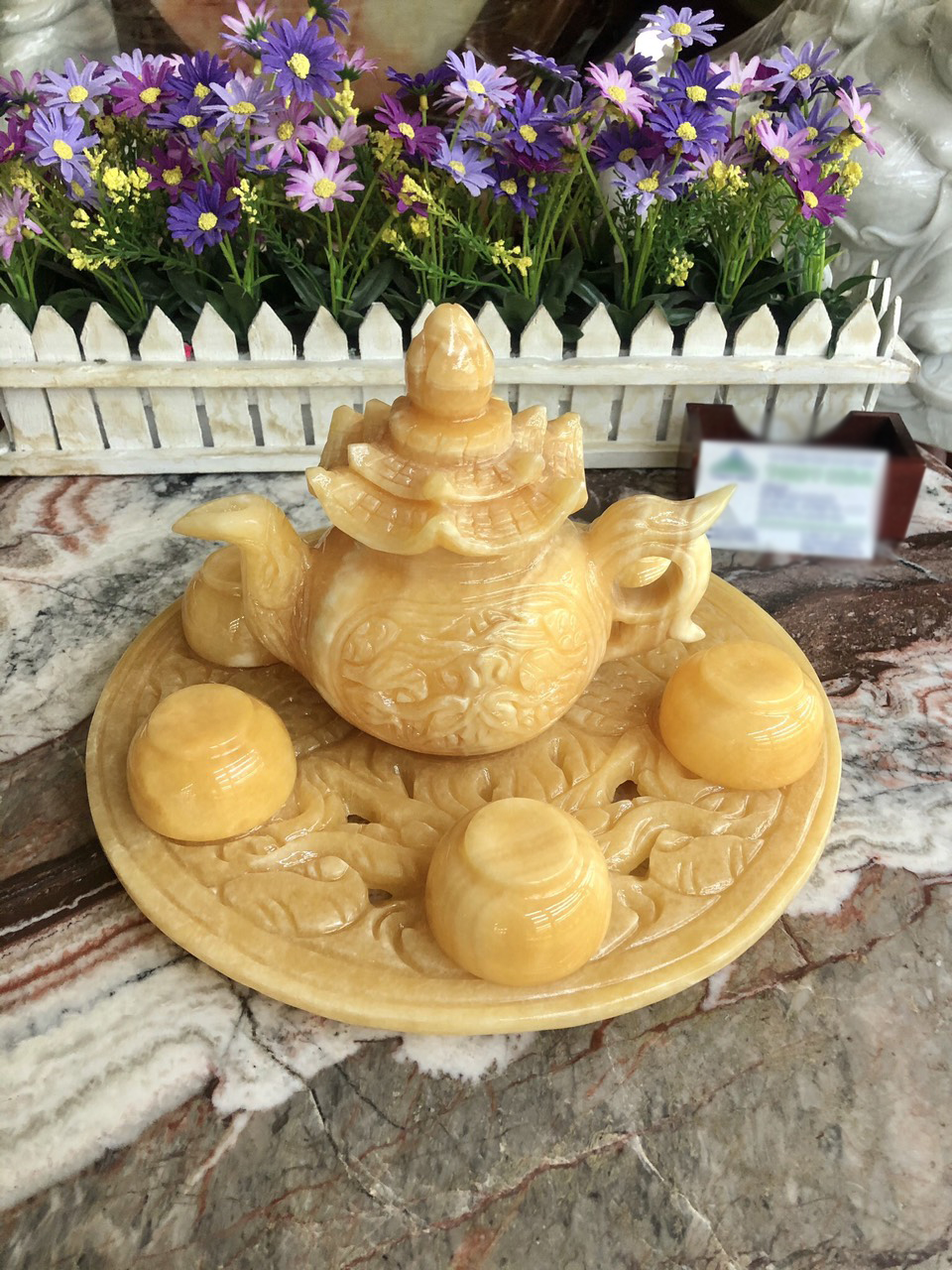 Bộ ấm trà chạm rồng đá ngọc hoàng long