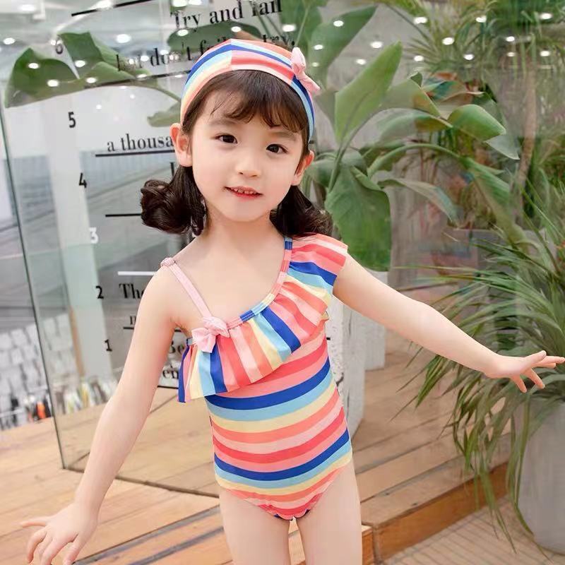Đồ bơi cho bé gái kẻ sọc cầu vồng lệch vai kèm mũ 7 màu liền thân chất siêu đẹp 1-8T - Misolbooks