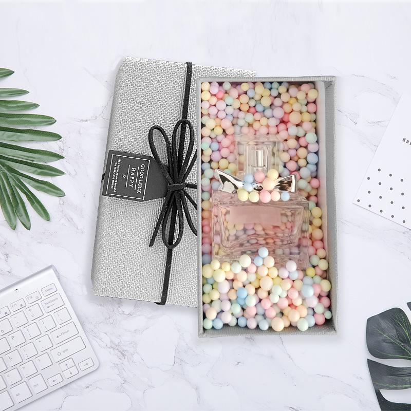Hộp bìa cứng giấy art gắn dây nơ & nhãn thankyou rất sang kích thước 13x7x5cm Q605