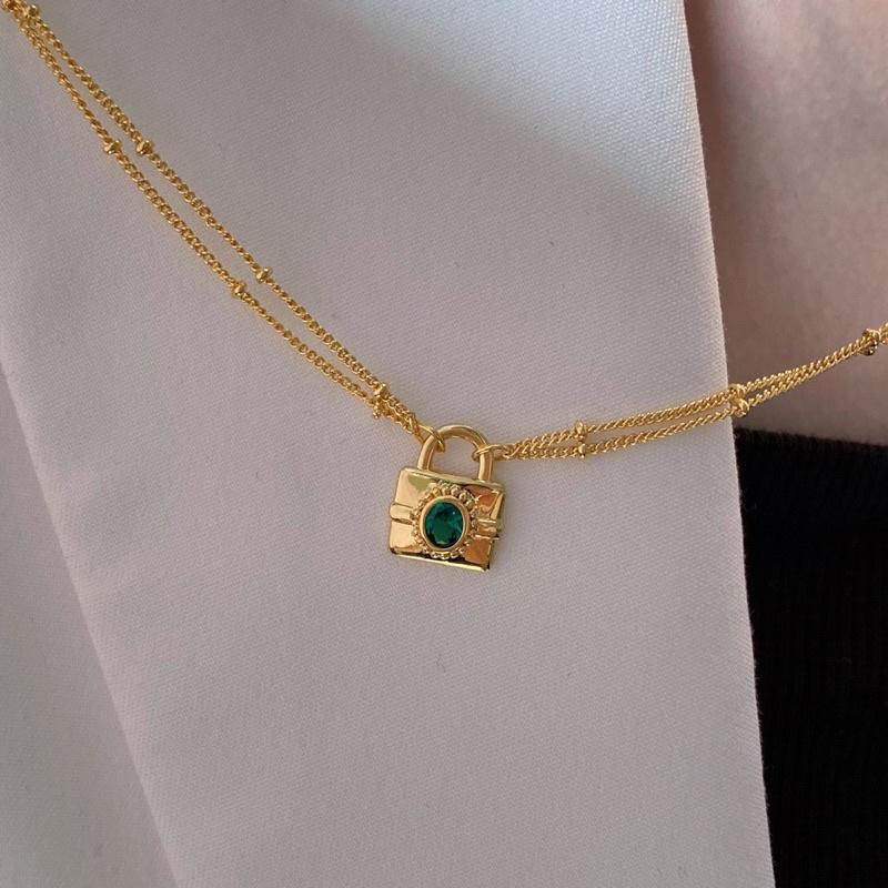 Dây chuyễn nữ titan không đen mặt ổ khoá lạ vintage đẹp Ring House