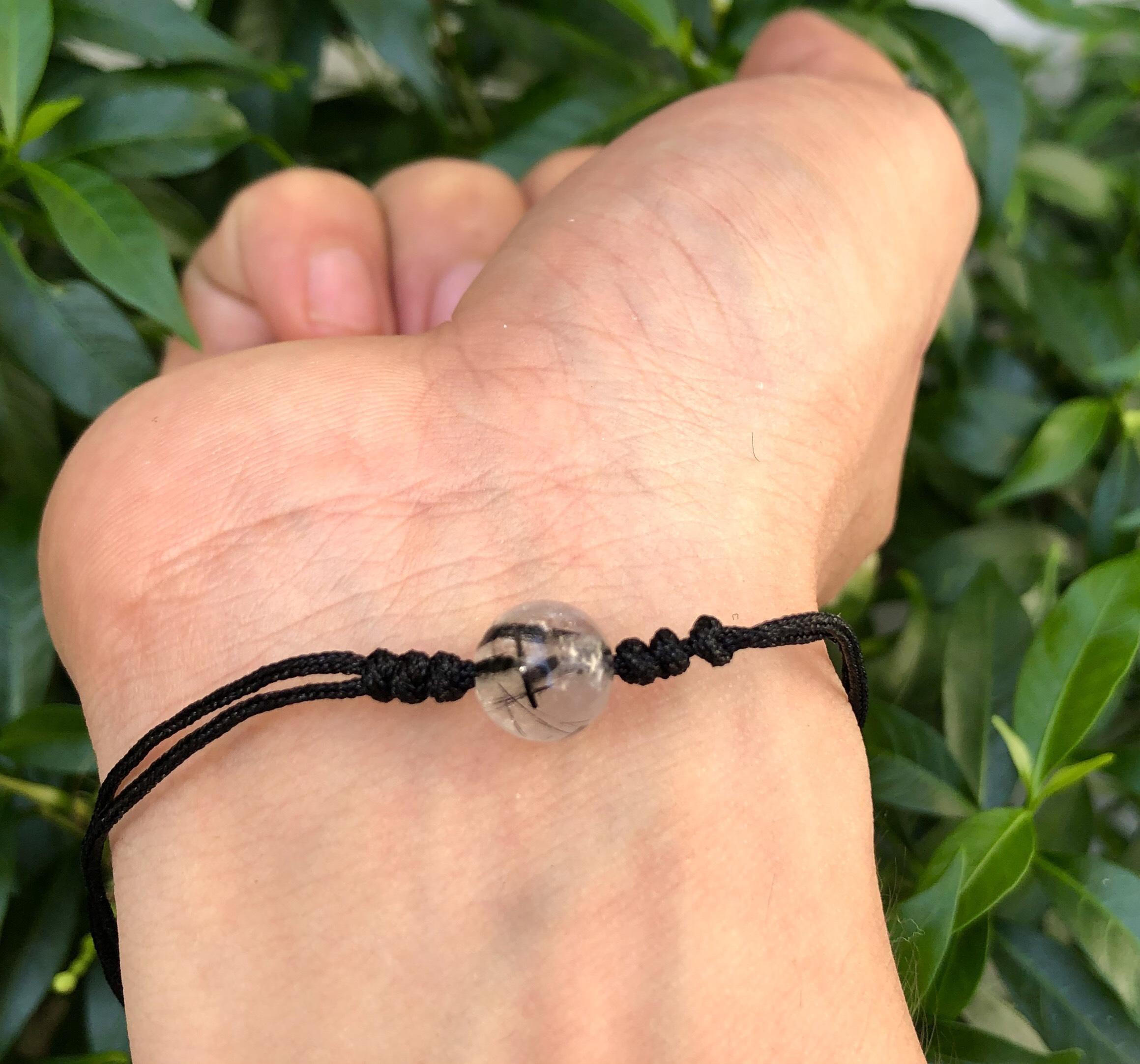 Vòng tay đá thạch anh tóc đen đan dây đen 8mm