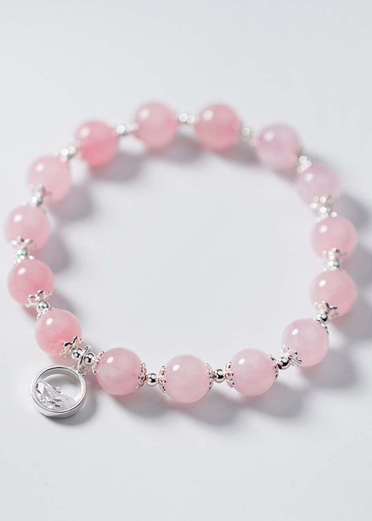 Vòng tay đá thạch anh hồng charm bạc tròn treo mệnh hỏa, thổ - Ngọc Quý Gemstones