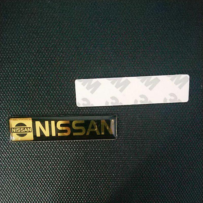 tem biểu tượng Nissan