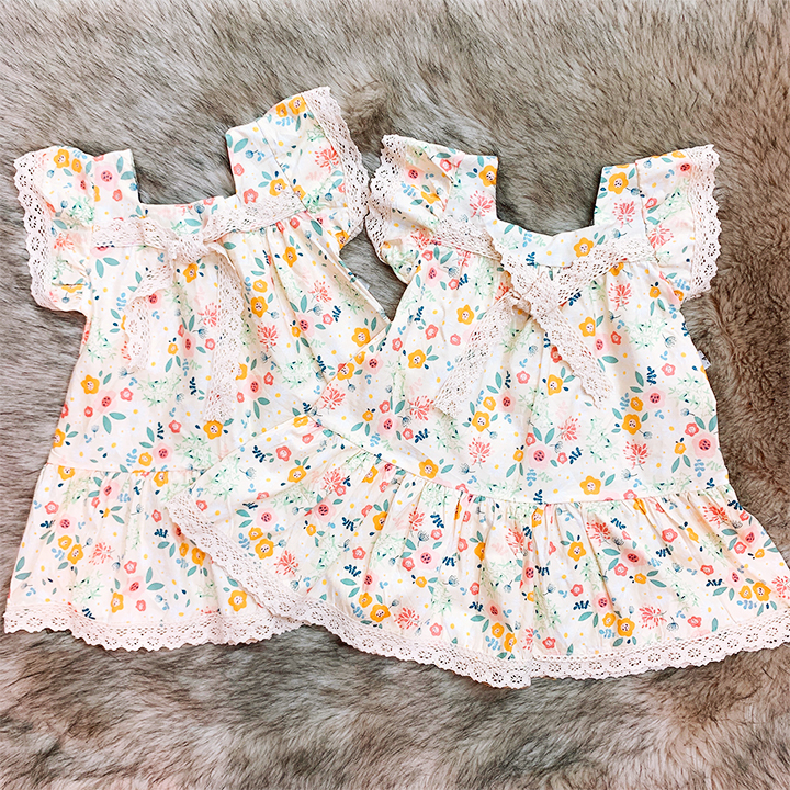 Đầm nơ ren cánh tiên cao cấp họa tiết hoa nhí nhẹ nhàng đáng yêu cho bé 1-7 tuổi chất cotton nhẹ mát – SD072