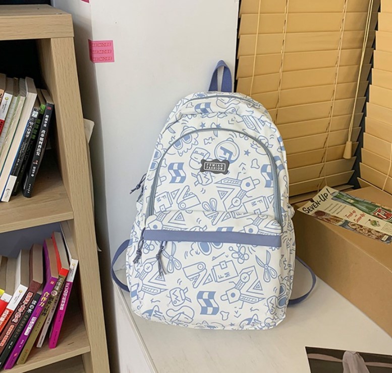 Balo vải học sinh, sinh viên thời trang in hình Doodle Dụng cụ học tập lạ mắt