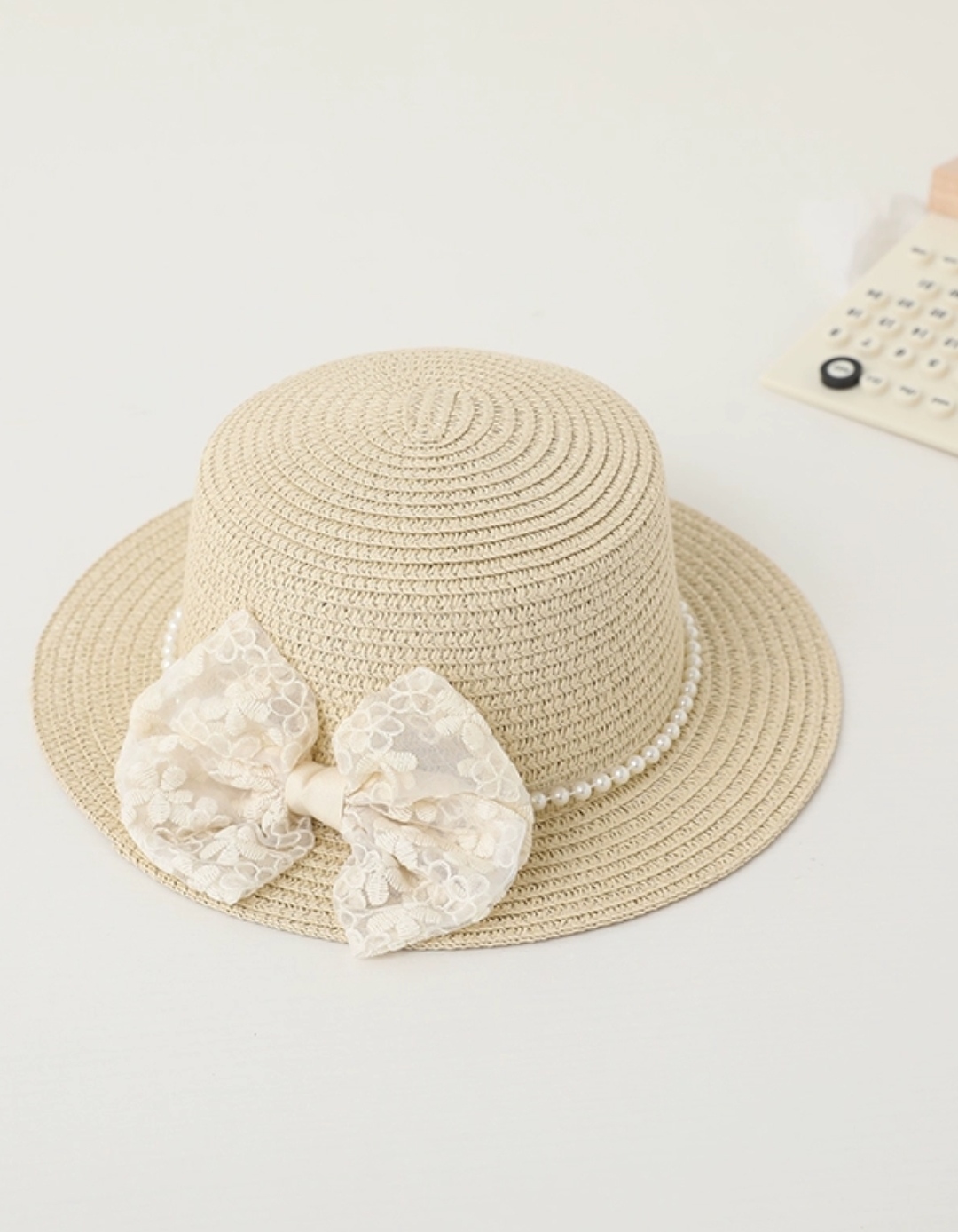 Nón mũ đi biển vành bằng phối đai ngọc trai nhân tạo nơ ren chất liệu cói chống nắng thoáng mát thời trang Hàn Quốc dona240698