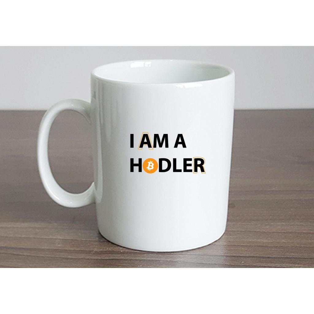 Ly Sứ Có Quai Họa Tiết Chữ Crypto I AM A HODLER - In hình lên ly sứ, cốc theo yêu cầu của bạn - IN HÌNH LỚP, CÔNG TY