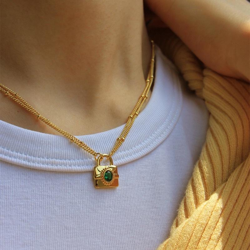 Dây chuyễn nữ titan không đen mặt ổ khoá lạ vintage đẹp Ring House