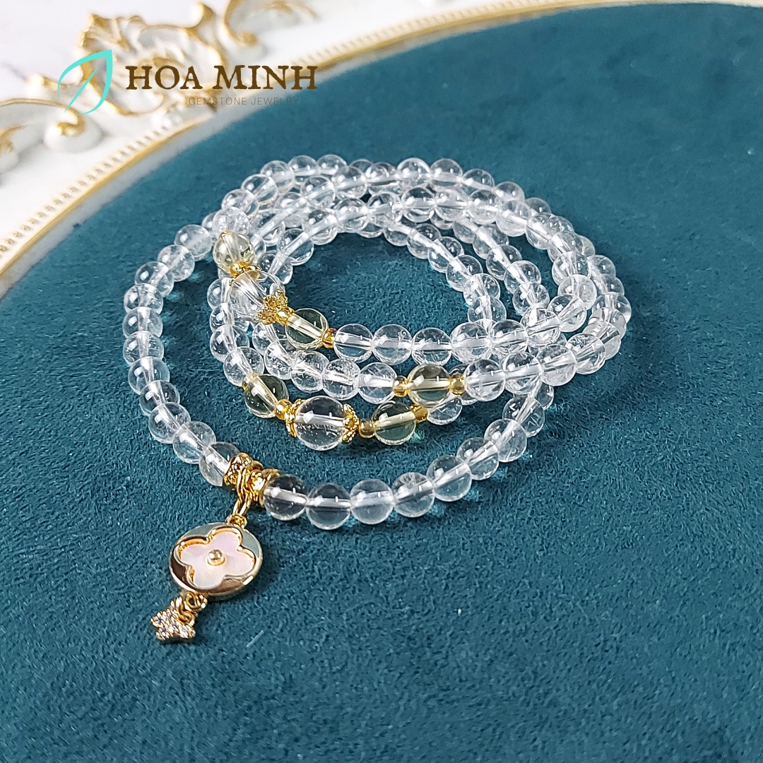 Vòng chuỗi 108 hạt Thạch Anh Trắng pha lê size hạt 6 li phối charm cỏ 4 lá và bướm nhỏ đính đá, ốp hoa, thạch anh vàng