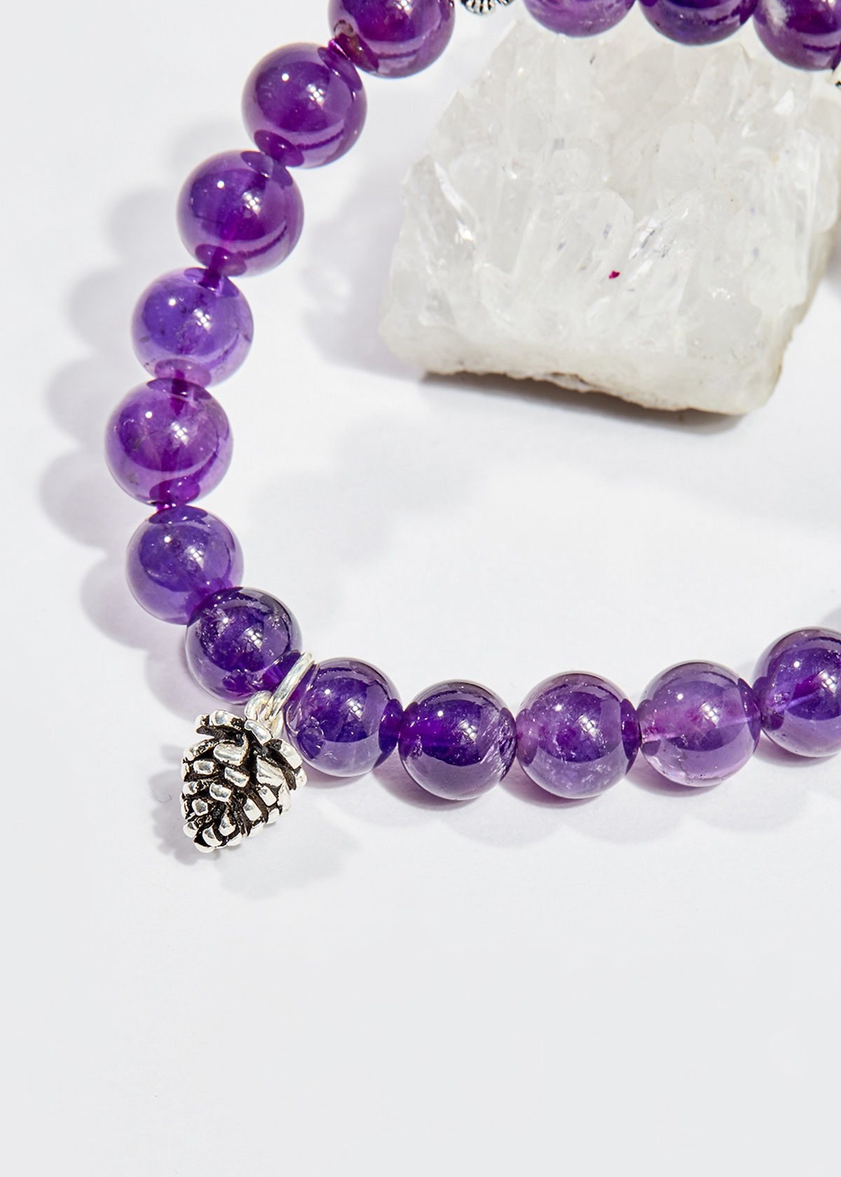 Vòng tay phong thủy nữ đá thạch anh tím charm trái thông 8mm mệnh hỏa , thổ - Ngọc Quý Gemstones