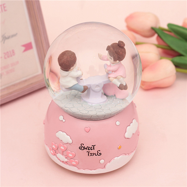 Hộp nhạc quả cầu tuyết bập bênh 