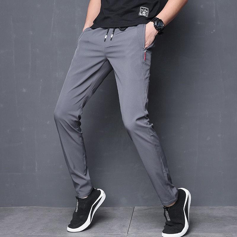 Quần jogger thể thao nam trơn chất gió dù mềm mịn