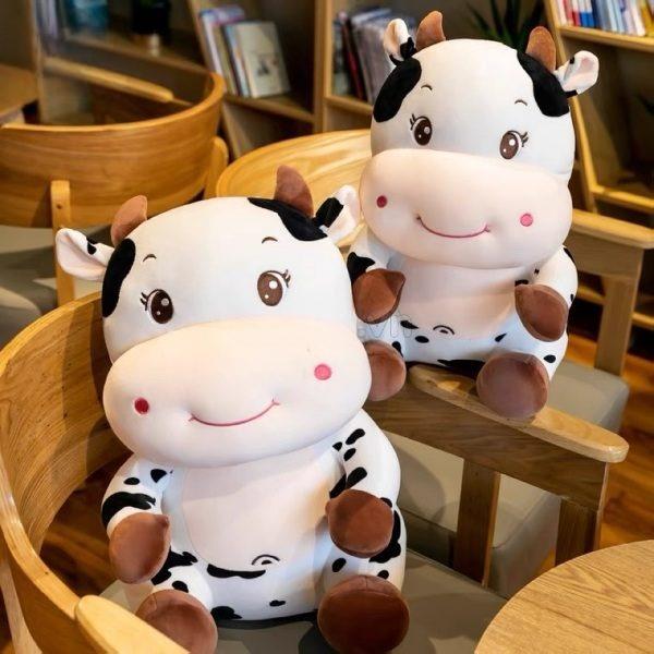 Gấu Bông Bò Sữa đáng yêu, chất nhung mềm mại không xù, không rụng lông.