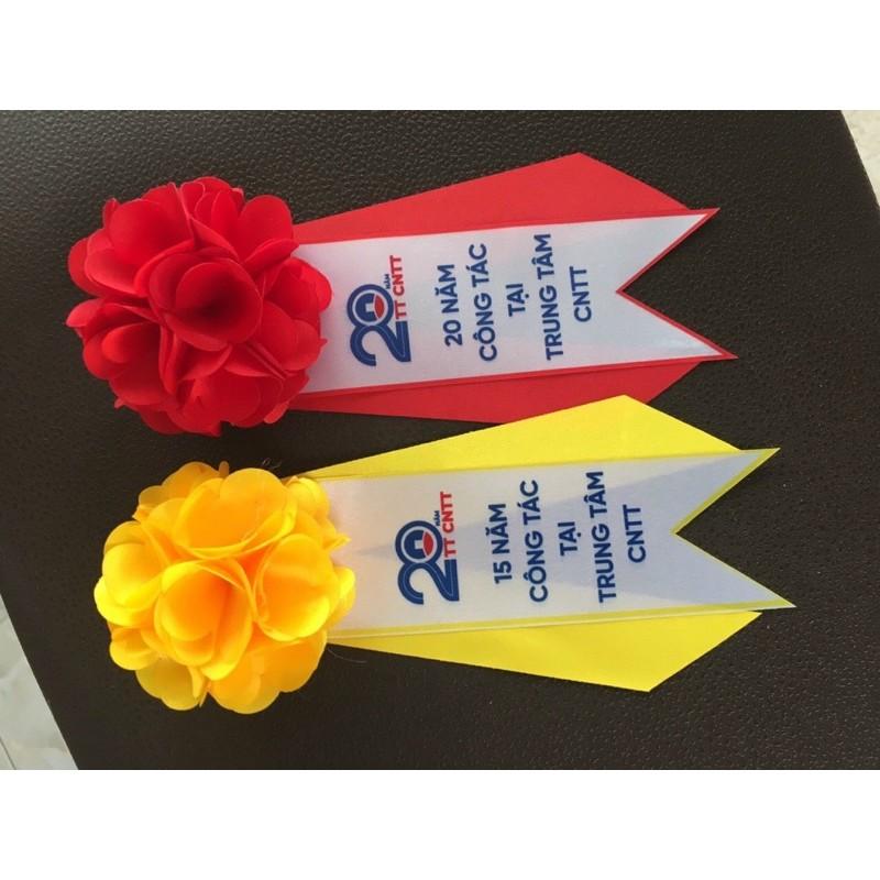 Hoa cài áo đại biểu