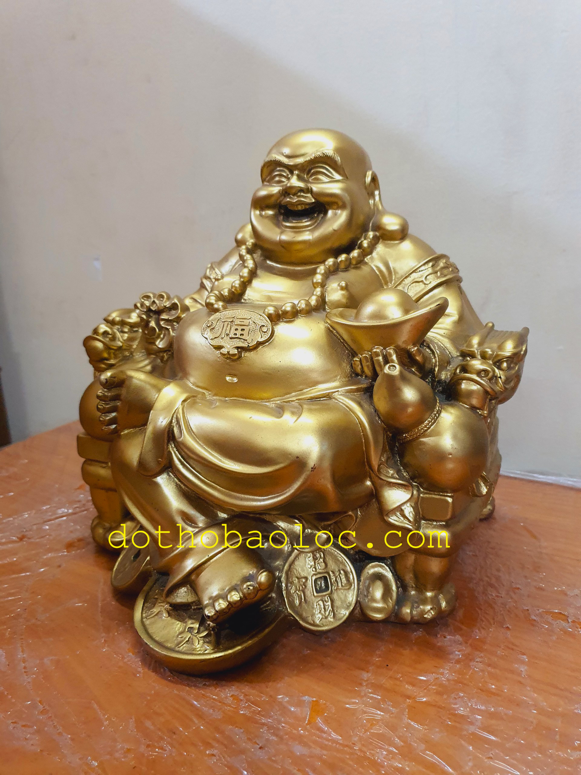 Tượng Di Lặc bột đá cầm thỏi vàng cao 28cm
