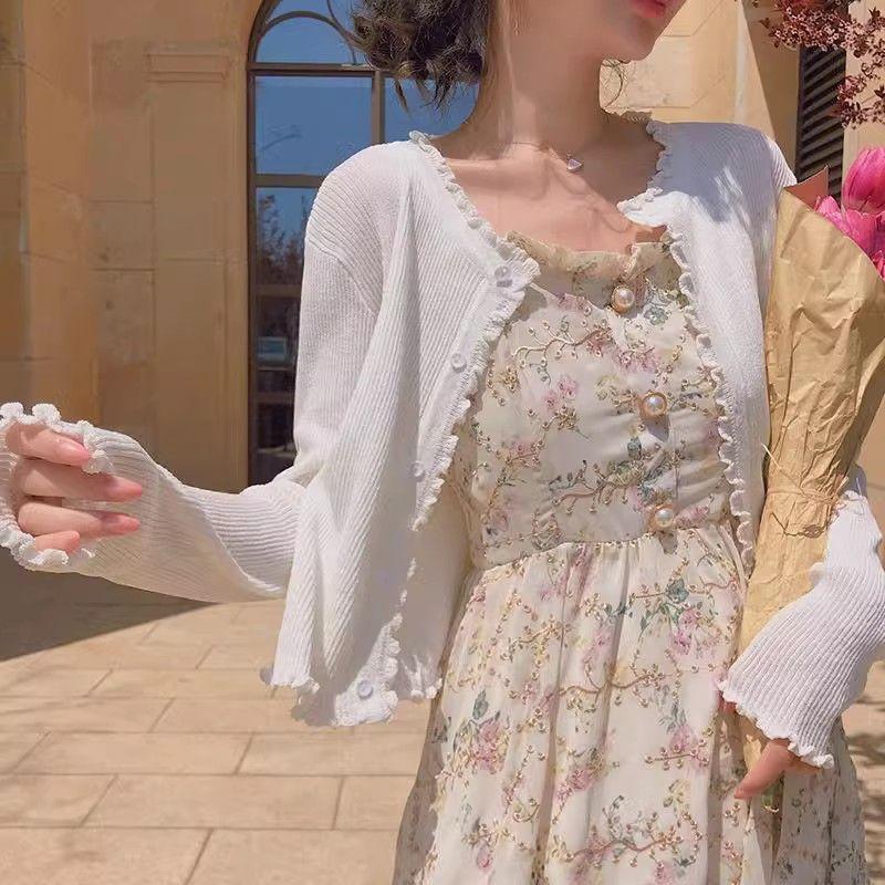 TOBE1SHOP Màu tím rỗng tay áo dệt kim đầm đám đông nhỏ thiết kế cảm giác Pháp khí chất treo Vest dài