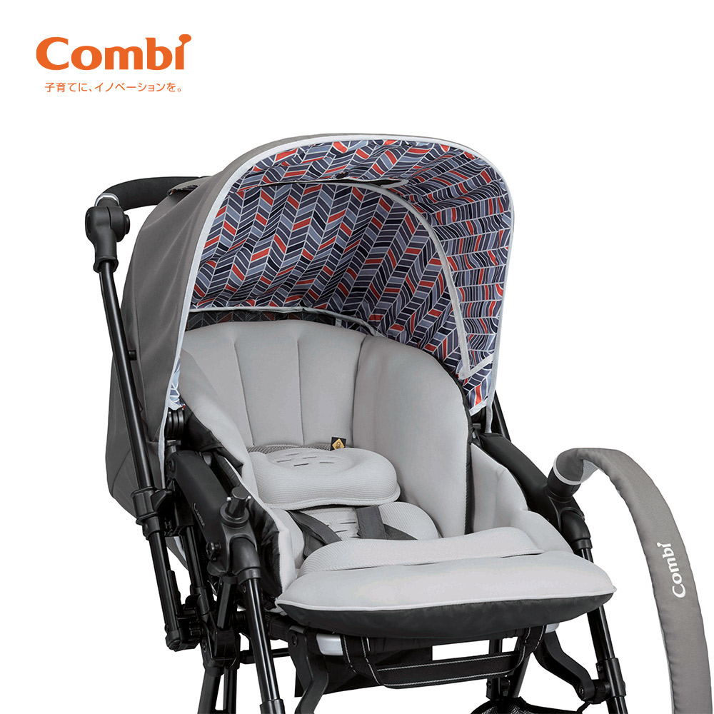 Xe đẩy Combi Sugocal Compact 4 bánh quay tự động màu đỏ/màu ghi