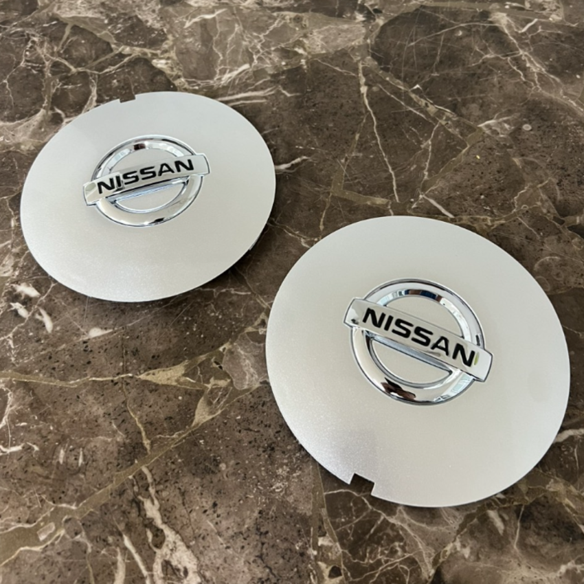 Logo chụp mâm, ốp lazang bánh xe ô tô Nissan Teana - Chất liệu: Nhựa PC+ABS - Đường kính 14.5cm