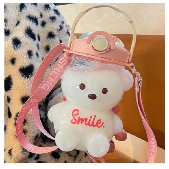 Bình đựng nước 1.1l hình gấu smile