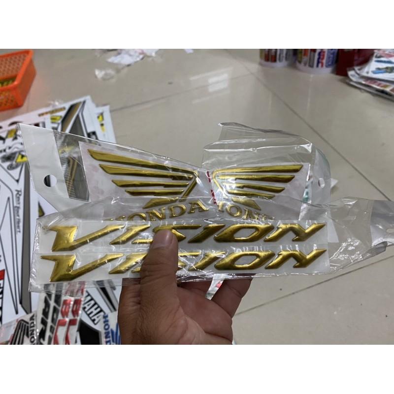 Cánh chim chữ vision vàng nhựa xi dẻo