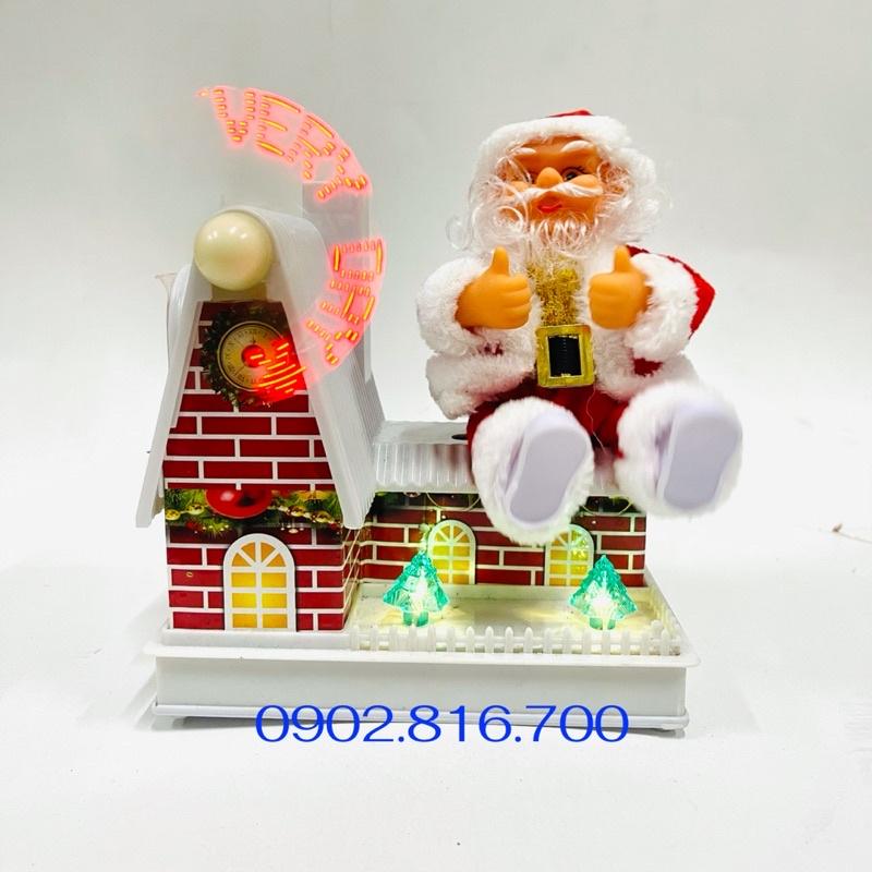 Đồ chơi ông già noel ngồi mái nhà xoay nhạc đèn quà tặng noel giáng sinh cho bé