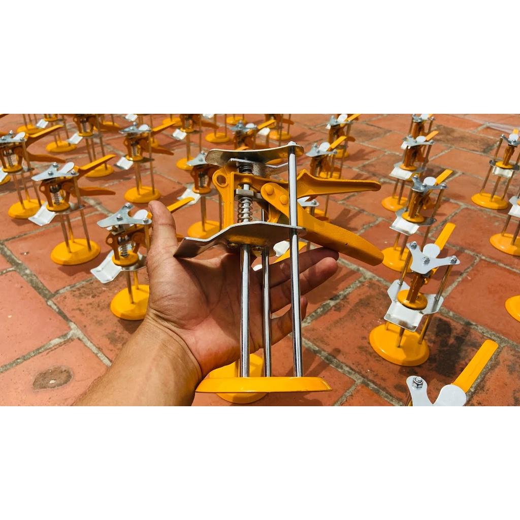 Kích kê gạch ốp tường bóp tay - Con đội gạch ốp tường 3 trụ-con đội nâng gạch đá ốp tường