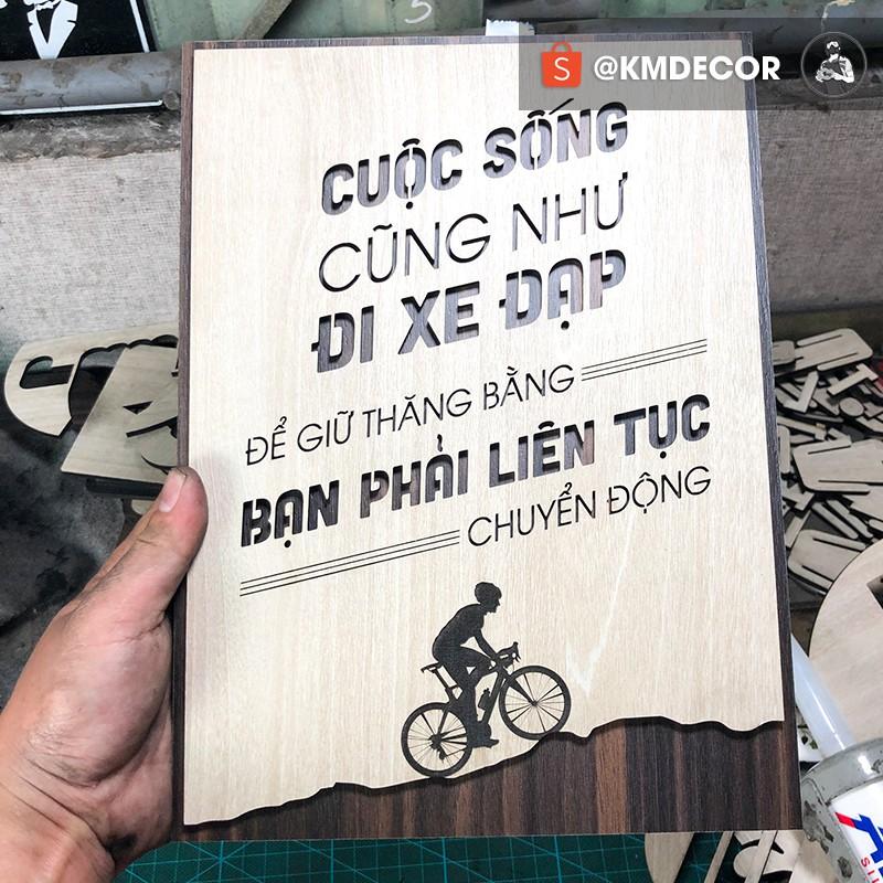 Tran gỗ - Tạo động lực mẫu câu &quot;cuộc sống cũng như đi xe đạp để giữ thăng bằng bạn phải liên tục chuyển động