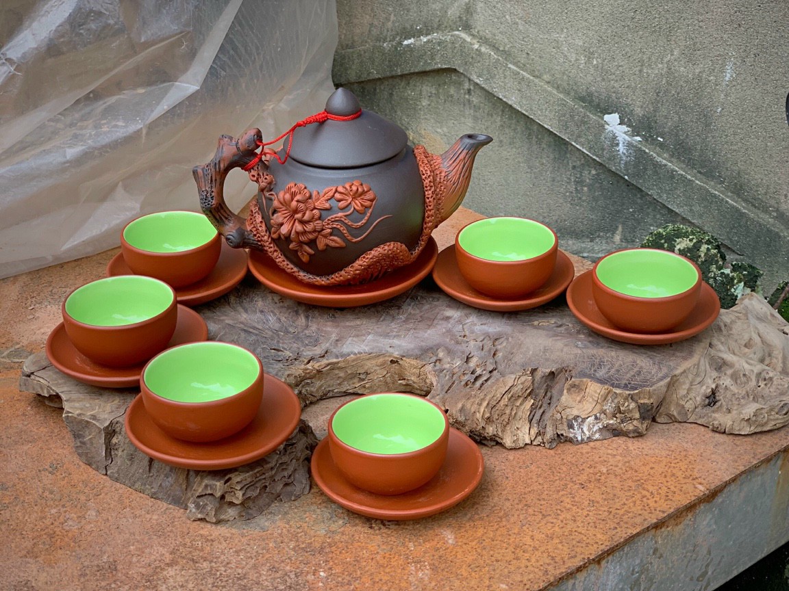 Bộ ấm tử sa đắp nổi hoa mai